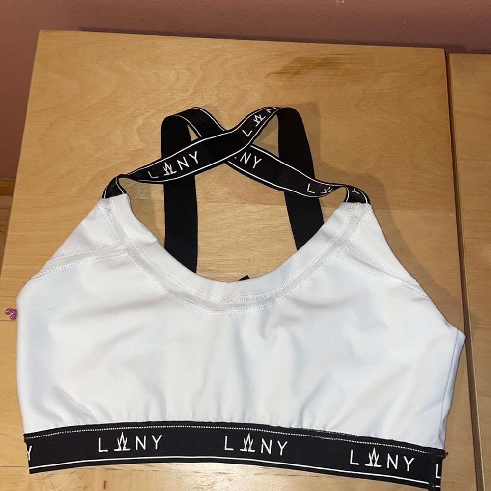 LA LA ANTHONY Logo Sports Bra. Size Medium. Used few times.
